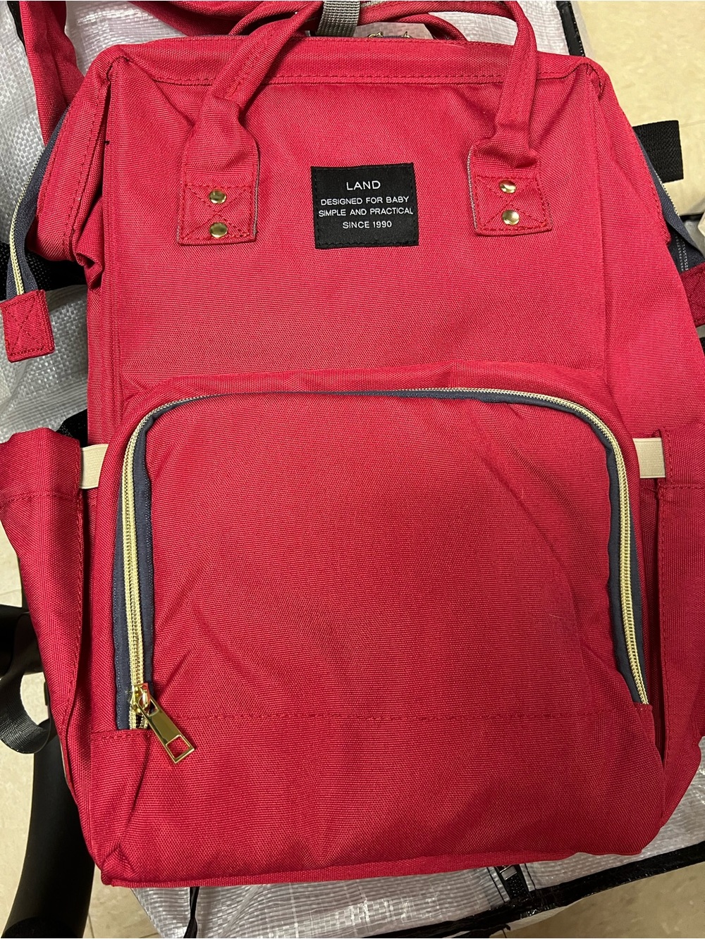 Land Red Backpack with Gold Hardware